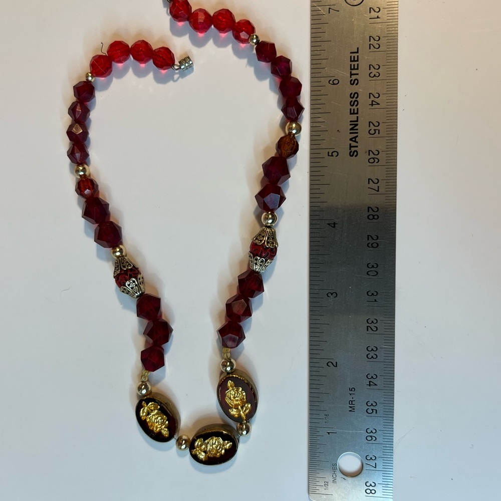 Red and Gold Beaded Necklace with Ornamental Accents